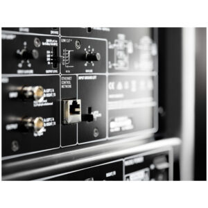 Neumann KH 750 DSP subwoofer rear panel: black finish, audio connectors, Ethernet port, and labeled inputs/outputs highlighted.