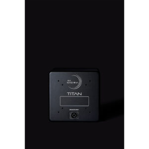 Prism Sound Titan black cube-shaped audio interface, circular logo, single front input, set on a solid black backdrop.