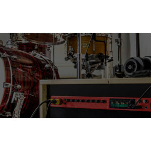 Focusrite Clarett+ 8Pre USB audio interface (rackmount, black/red) with drum set in close-up studio setup.