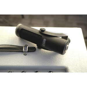 Stager SR-5 handheld black microphone with textured grip and SACH logo rests on white surface beside a stitched dark strap.