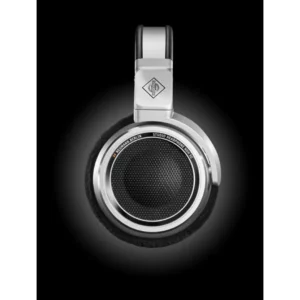 Side view of a Neumann NDH 30 Open Box headphone, featuring a sleek silver and black design with plush black ear pads and a distinctive round mesh ear cup, all showcased against a refined dark gradient background. Discover premium listening with Neumann headphones—available now at Providence Sound And Vision.