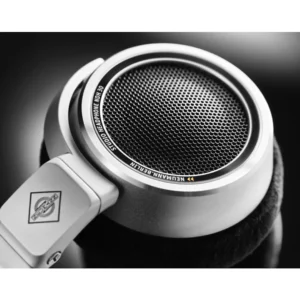 Close-up of a Neumann NDH 30 Open Box studio headphone earcup, showcasing its sleek silver finish, black mesh grille for superior sound quality, and detailed Neumann branding around the rim—available now at Providence Sound And Vision.