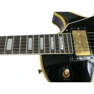 Gibson Custom 1957 Les Paul Reissue, SN 71228—gold hardware, inlaid markers, pickups, and glossy sunburst finish.