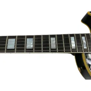 Gibson Custom 1957 Les Paul Reissue neck and fingerboard with MOP inlays, silver frets, and sunburst body detail.