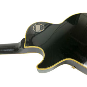 Rear view of a preowned Gibson Custom 57 Les Paul Reissue, SN 71228; yellow trim, round electronics cover, light wear.