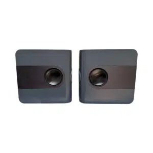 Kii THREE Dark Grey Pair (SN 3002/3003) powered speakers, side by side, with remote; circular speaker openings.
