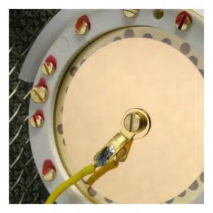 Neumann U 87 Ai Set Z condenser mic capsule: circular gold surface, white ring with red-marked screws, yellow center wire.