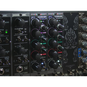 Cranborne Audio Carnaby 500 Harmonic EQ in a rack, black knobs, switches, labeled controls, input/output ports visible.