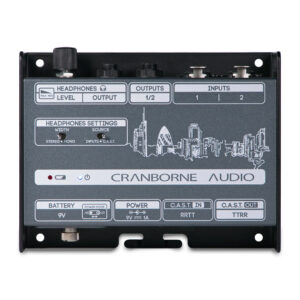 Cranborne N22H rectangular audio interface with labeled knobs, switches, I/O ports, city skyline graphic, and control panel.
