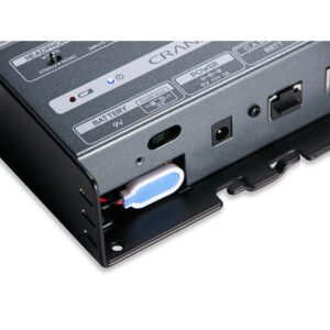 Cranborne Audio N22H panel close-up: labeled ports, power switch, battery compartment, black brackets on metallic surface.