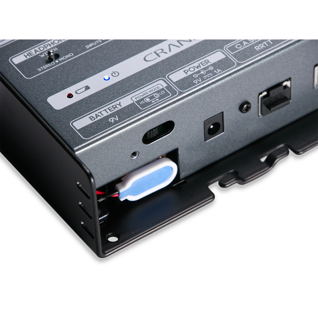 Cranborne Audio N22H panel close-up: labeled ports, power switch, battery compartment, black brackets on metallic surface.