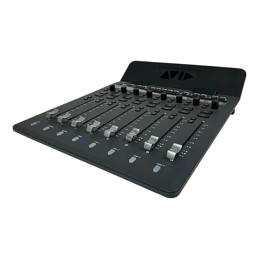 Preowned Avid S1 black audio mixing control surface, 8 silver faders, AVID logo on tilted back panel, angled for detail.