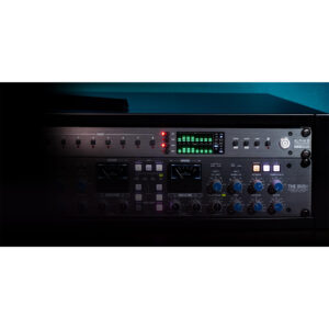 SSL Alpha 8 AD/DA Converter: silver rackmount with dials, meters, LEDs; partially lit in a dark studio environment.