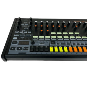 Behringer Rhythm Designer RD-8 drum machine, preowned, with black panel and colorful orange, yellow, and gray buttons.