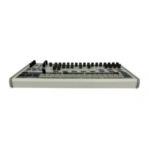 Preowned Behringer RD-9 drum machine, white casing, black knobs, grey buttons, and sliders, front view on white background.