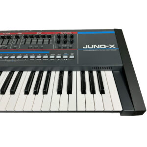Preowned Roland Juno X synthesizer, SN Z5N1615, with keys, knobs, sliders, buttons, and JUNO-X logo on the top panel.