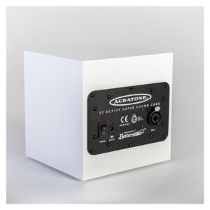 White Auratone 5C Active speakers on a light surface, rear view with logo, input ports, power switch, and labels visible.