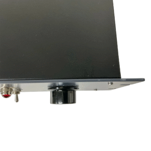 Dangerous Liaison SN 1099 preowned rack device detail: black knob, toggle switch, red light on silver panel, white background.