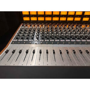 Rupert Neve 5088 Console SN0251, preowned, well-maintained; close-up of knobs, faders, yellow VU meters in rackmount.