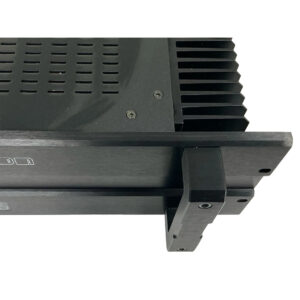 Bryston 7B SST Pro black rackmount audio amplifier, SN 7BSST-000921, vented metal case, fin heat sink, white backdrop.