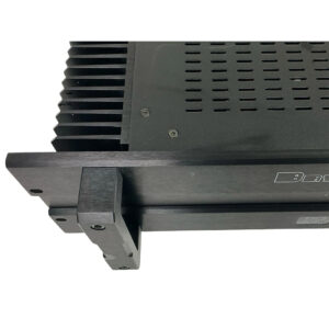 Bryston 7B SST Pro black rackmount amp, vented top, side heat sinks, visible brackets, front logo. Preowned SN 7BSST-000921.