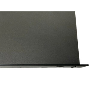 Matte black Trinnov Nova panel, rectangular with folded edge, shown close-up on white; professional audio equipment.