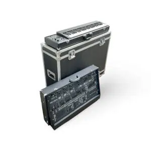 Preowned black synth keyboard and ARP 2600 analog synthesizer with hard case on white background; vintage style.