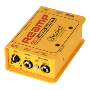 Radial X-Amp Reamp Studio device in yellow with labeled controls, level knobs, toggles, and dual output jacks.