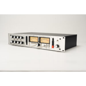 Z&H Designs 2H 1178 rackmount stereo limiter, silver panel, dual analog VU meters, control knobs; on white surface.