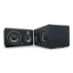 Preowned Focal SM9 studio monitor speakers, one front-facing and one angled, highlight sleek design and visible drivers.